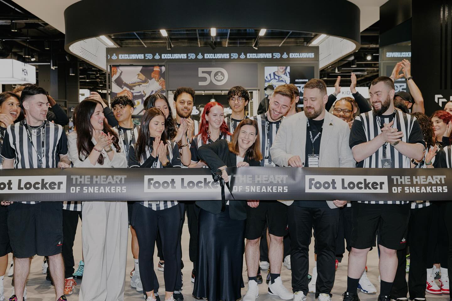 Reviewing eligibility requirements for a Foot Locker store program